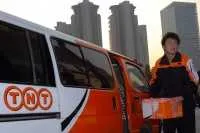 TNT אקספרס מוכרת את רשת ההובלה היבשתית בתוך סין