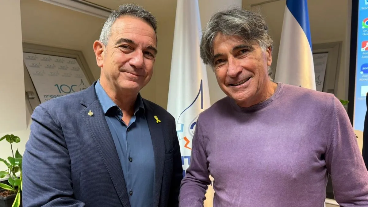 נשיא התאחדות התעשיינים, ד״ר רון תומר, ומריאן מר