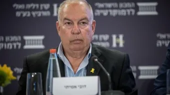 יו״ר נשיאות המגזר העסקי, דובי אמיתי, בכנס אלי הורוביץ לכלכלה וחברה